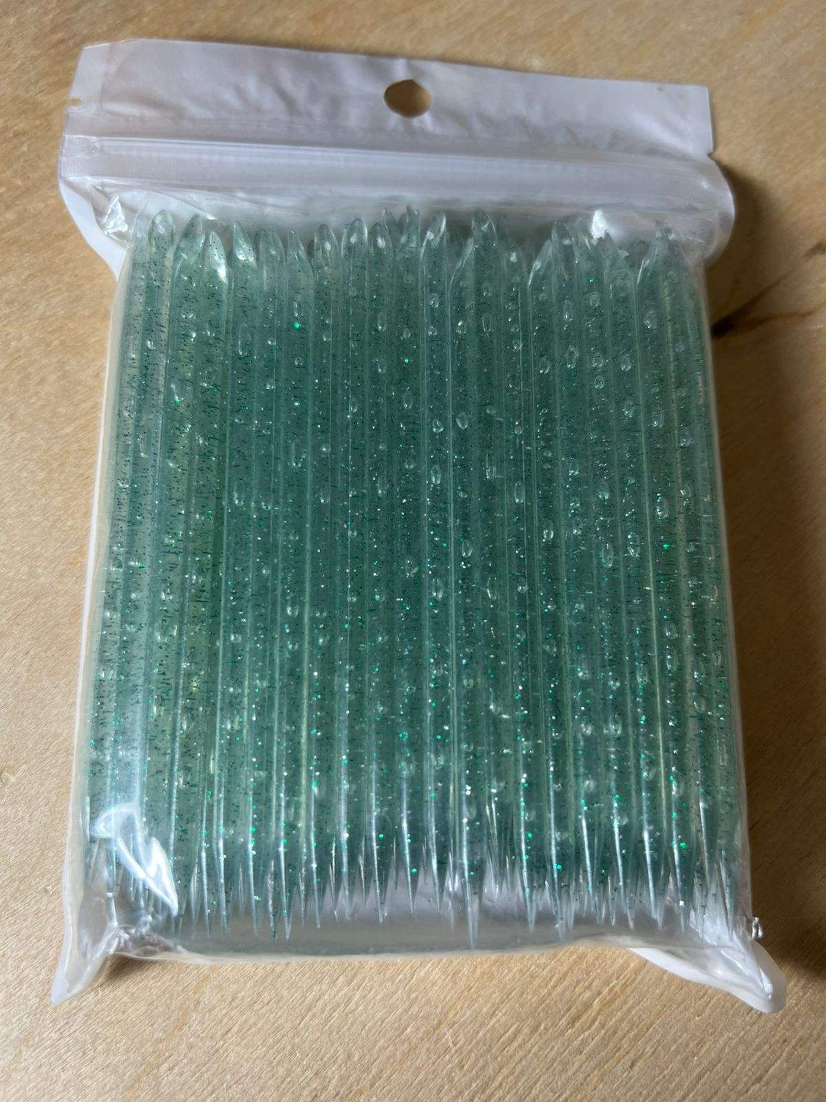 Orange sticks plastic, green color